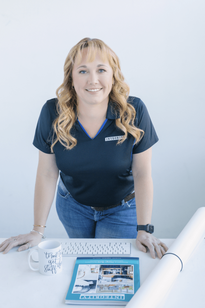 Headshot of Heidi, an Integrity team member, smiling in professional portrait photo.