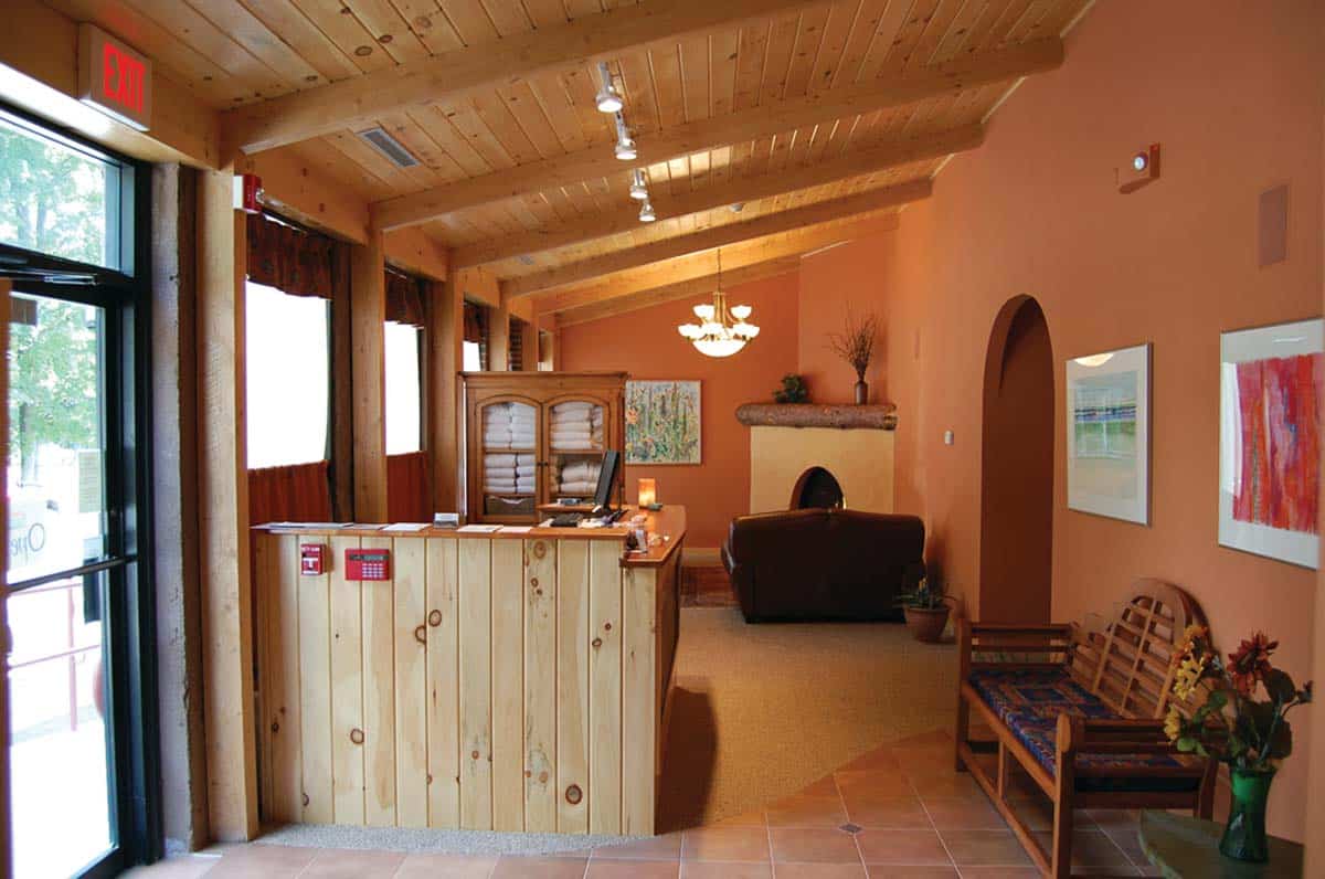 Photograph of a hot tub and spa renovation featuring a custom sauna installation completed by Integrity Development & Construction in Amherst, MA.