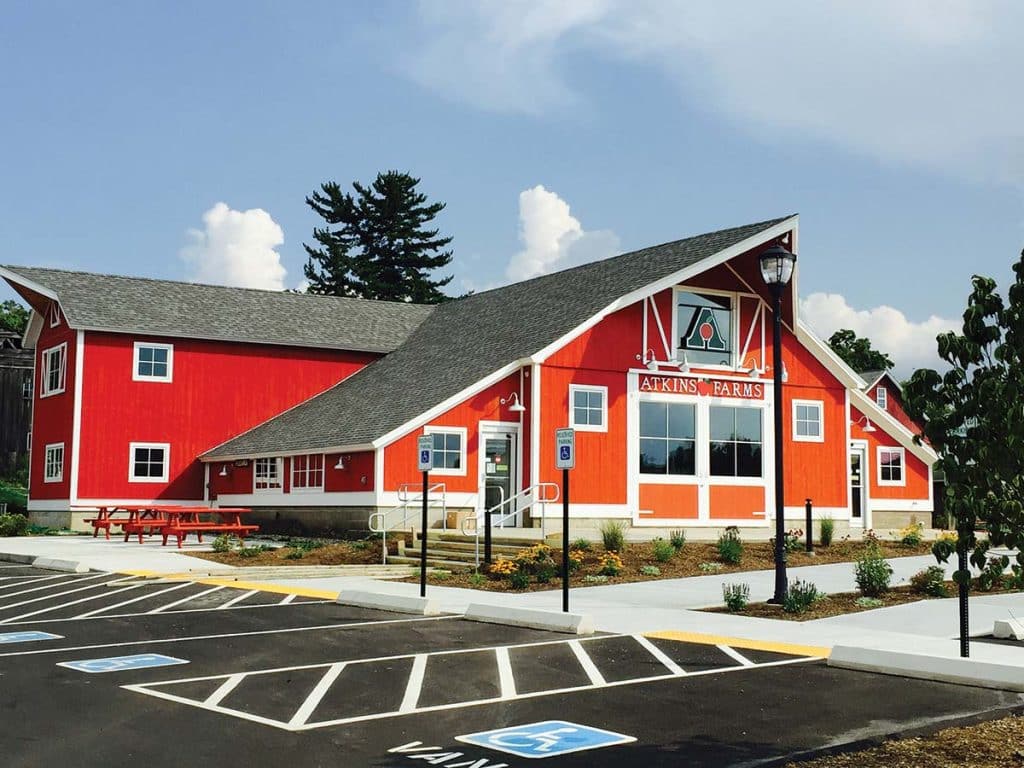 Photograph of a barn conversion into a grocery store designed by Kuhn Riddle Architects and completed by Integrity Development & Construction in Amherst, MA.