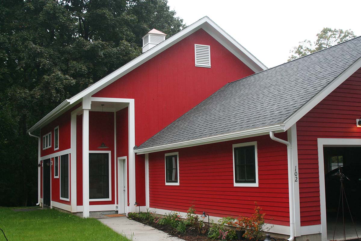 Photograph of a custom duplex home built by Integrity Development & Construction in Amherst, MA.