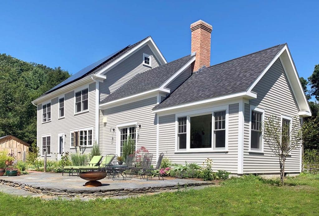 Photograph of a custom home and carport built by Integrity Development & Construction in Conway, MA