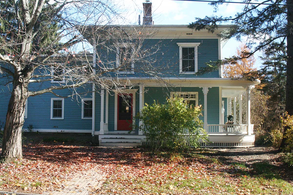 Photograph of a historic porch restoration completed by Integrity Development & Construction in Amherst, MA.