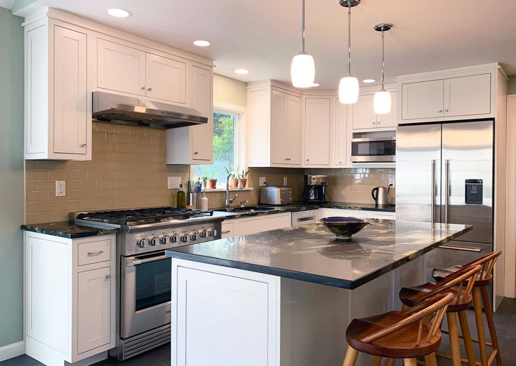 Interior photograph of a kitchen and bathroom renovation completed by Integrity Development & Construction in Amherst, MA.