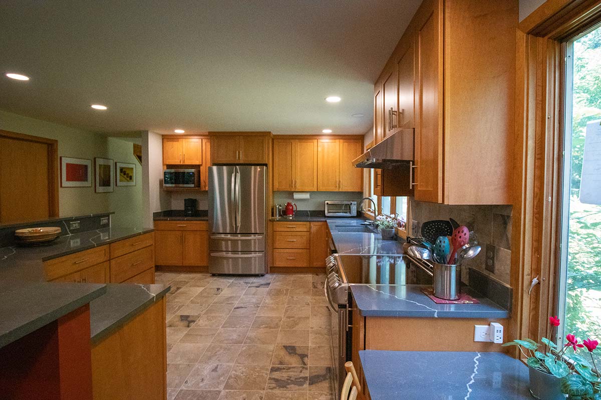 Interior photographs of a kitchen renovation completed by Integrity Development & Construction in Amherst, MA.