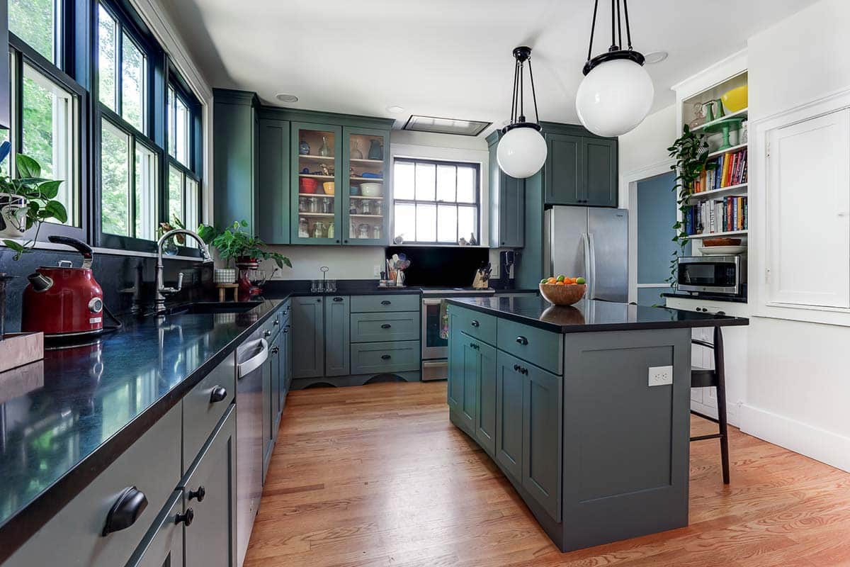 Photograph of a kitchen, bathrooms, and entry hall renovation completed by Integrity Development & Construction in Amherst, MA.