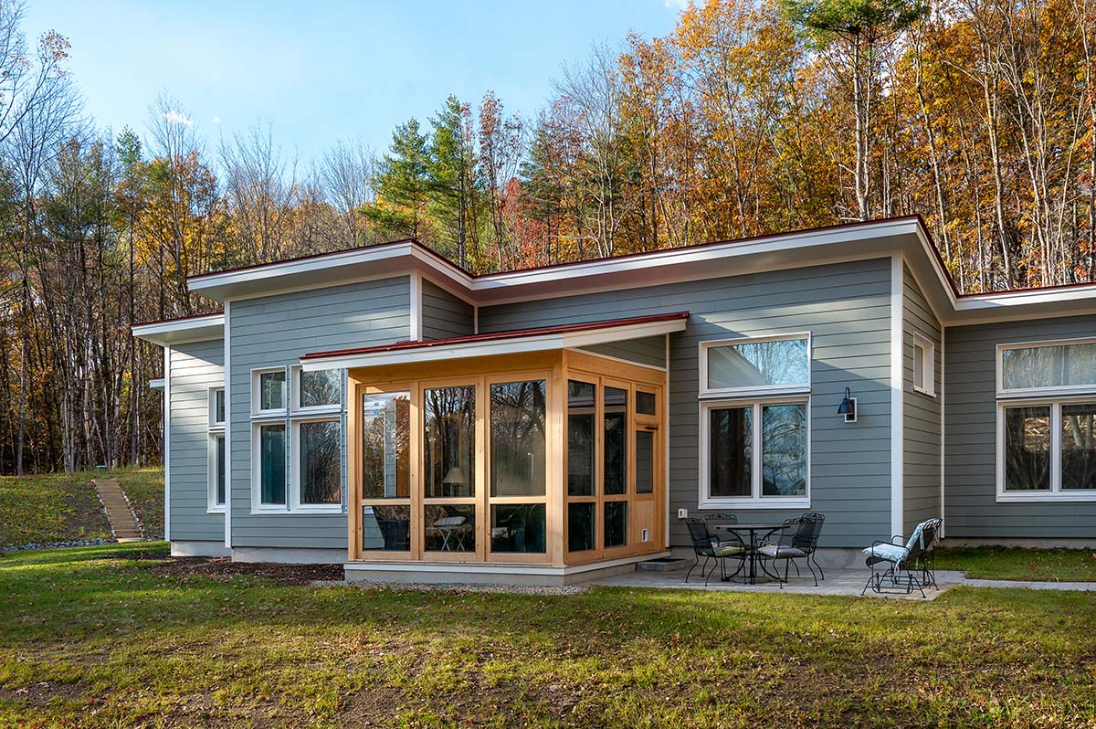 History Timeline 12 Photograph of an Aging-in-Place Unity Home featuring an attached garage and outdoor shower built by Integrity Development & Construction in Gill, MA.